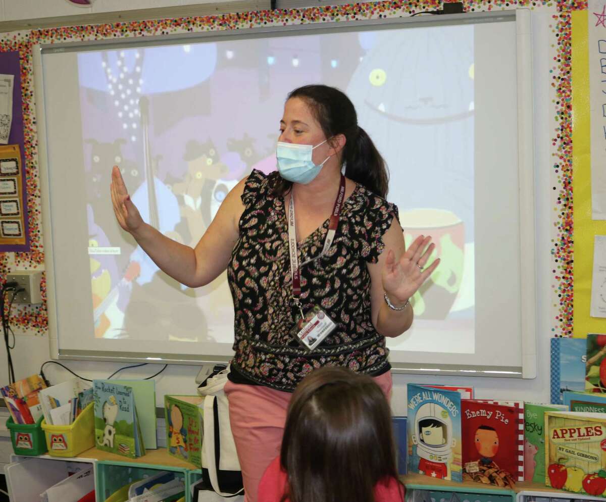 Elementary Spanish Teacher Eliza Smernoff, immerses her kindergarten class with songs and dance, all in Spanish, at Live Oaks Elementary School.
