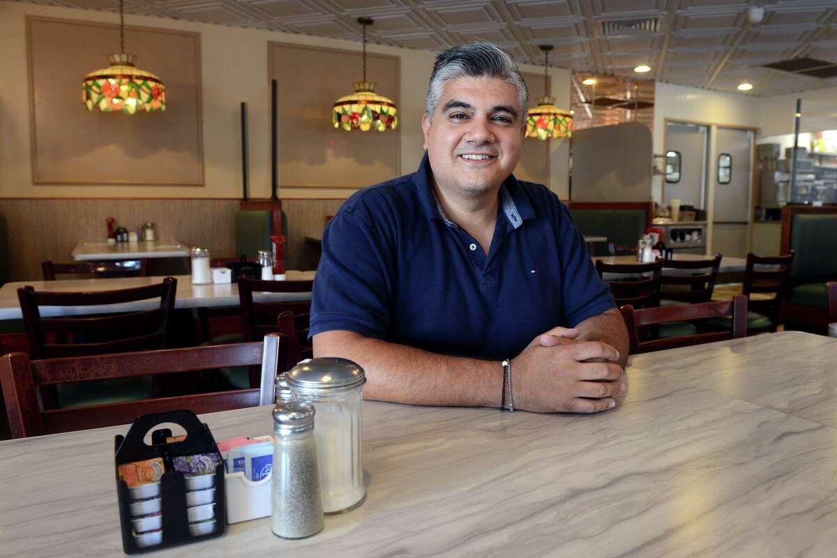 Owner Nick Roussas in the dining room at Frankie’s Diner, in Bridgeport, Conn. Sept. 30, 2021.