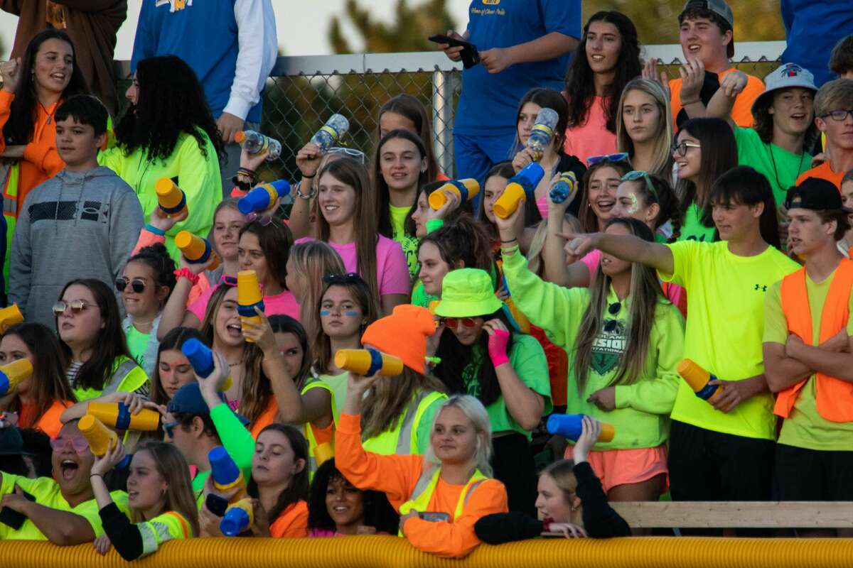 Chemics fans cheer during their game against Bay City Western Friday, Oct. 1, at Bay City Western High School. (Drew Travis/for the Daily News)