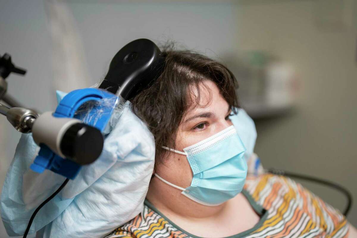 Sarah, a woman with severe depression, has been nearly symptom-free for a year after UCSF scientists implanted a device in her brain that uses electrical stimulation to stop depressive thoughts.