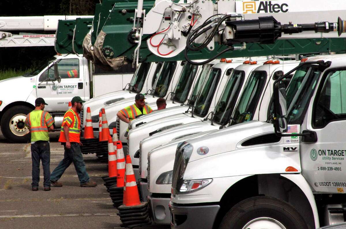 File photo — utility crews stage in Trumbull, Conn.