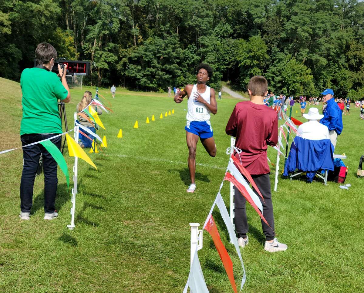 Gitch Hayes of La Salle reaches the finish of the Division I boys' race more than 50 seconds in front of his closest competitor at the Grout Invitational on Saturday at Central Park in Schenectady.