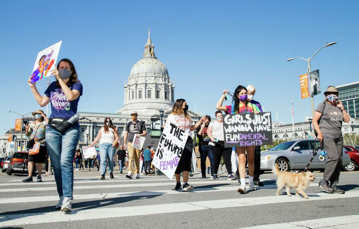 Protesters gather outside San Francisco City Hall to mark the start of the march for reproductive rights.  Rallies are scheduled across the country this weekend, a month after the US Supreme Court upheld the nation's strictest anti-abortion law, enacted by Texas.