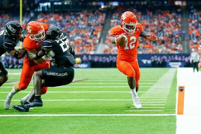 sam houston rallies past rival sfa in battle of the piney woods