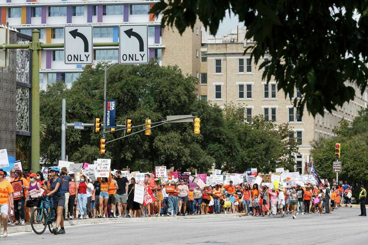 People march in downtown San Antonio in support of abortion rights.