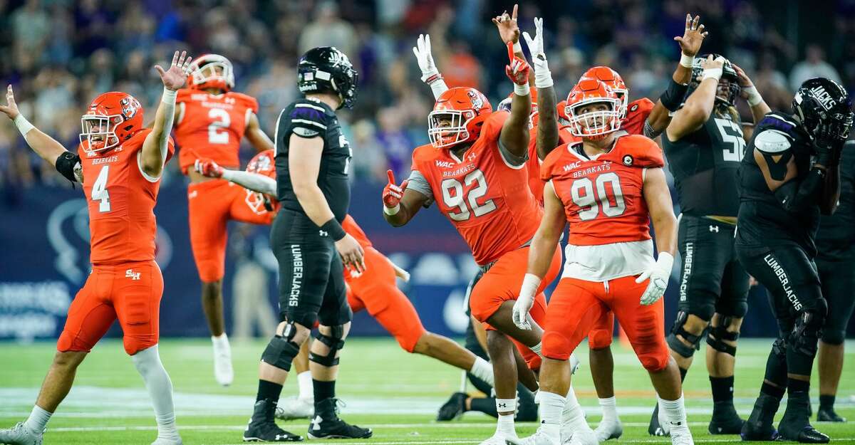 sam houston rallies past rival sfa in battle of the piney woods