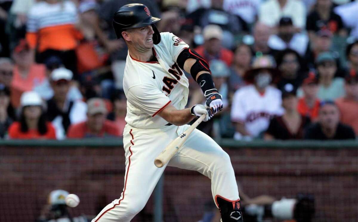 San Diego Padres catcher Victor Caratini throws to first for the out on San  Francisco Giants' LaMonte Wade Jr. during the second inning of a baseball  game Wednesday, Sept. 22, 2021, in