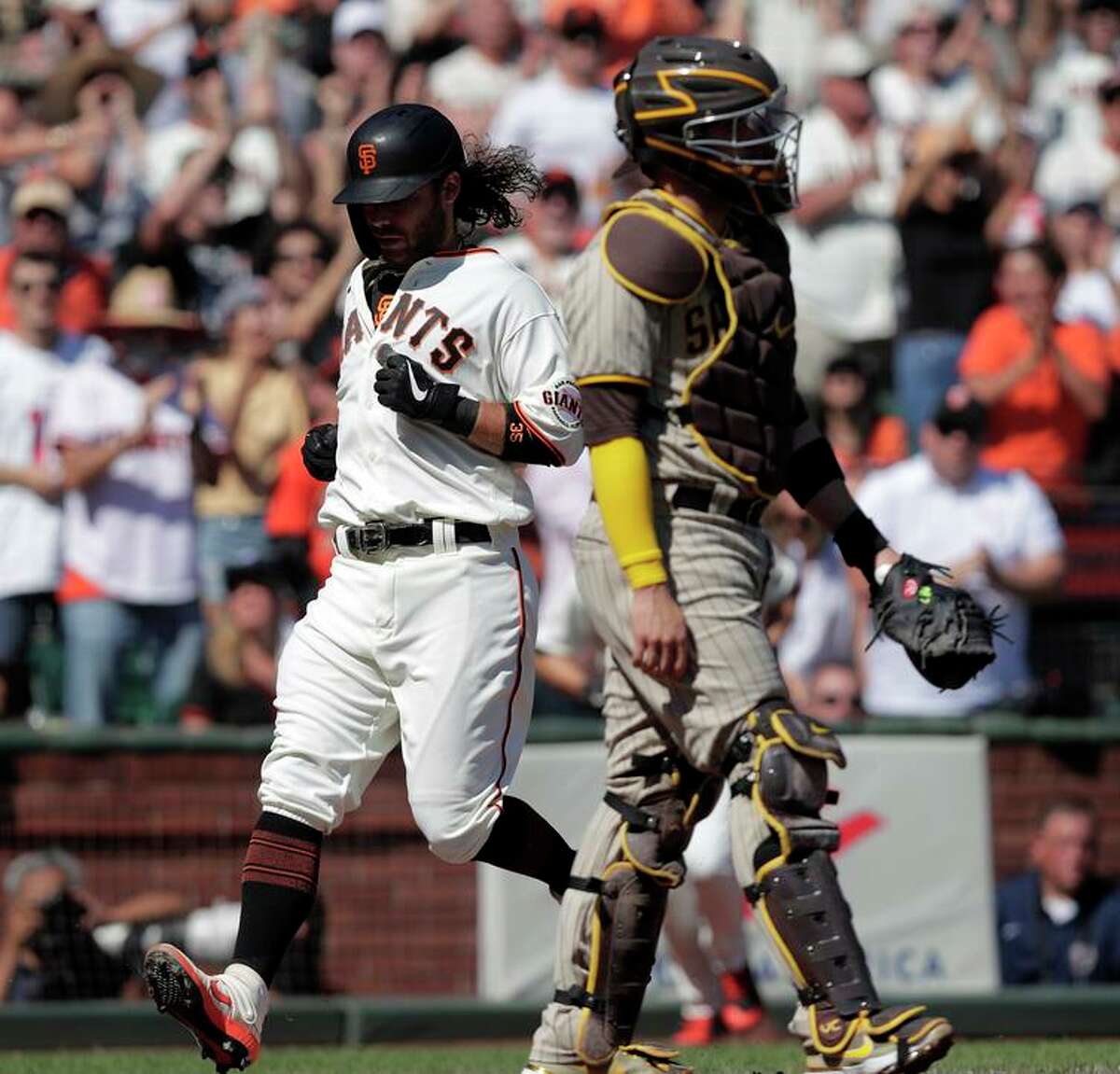 September 14, 2021: San Francisco Giants third baseman Kris Bryant (23)  throws to first base, during a MLB game between the San Diego Padres and  the San Francisco Giants at Oracle Park