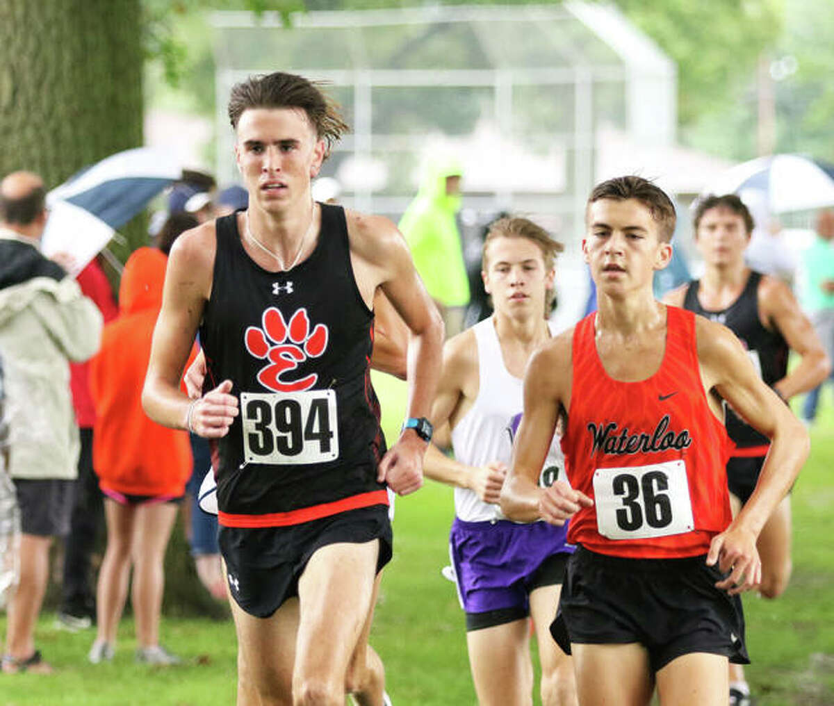 Edwardsville’s Ryan Watts (left) runs with Waterloo’s Joe Schwartz during the Granite City Invite on Sept. 4 in Granite City. On Saturday the Peoria Invite at Detweiller Park, Watts posted a PR to finish third in the Class 3A race. Schwartz ran seventh in the Class 1A/2A race.