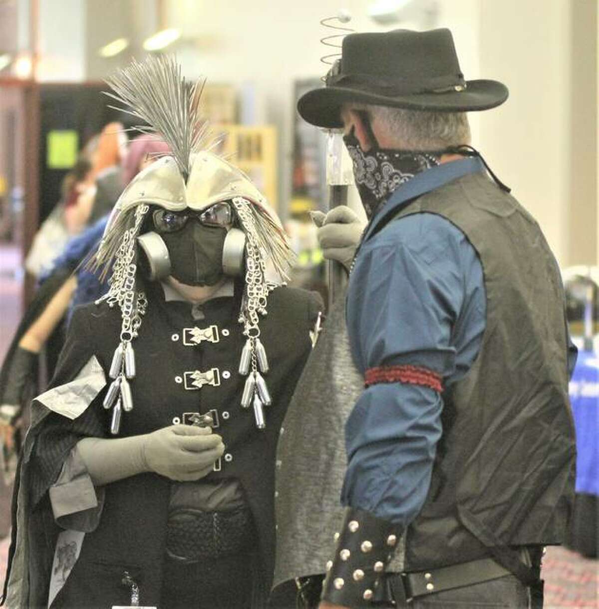 Snail Scott, left, a St. Louis-based sculptor wearing a costume she describes as “Post-Apocalyptic Plague Shaman,” talks with another participant at Archon, the region’s premier Sci-Fi/Fantasy convention, held Oct. 1-3 in Collinsville’s Gateway Convention Center. After missing last year because of COVID, the convention returned this year, although somewhat subdued and about half the normal attendance.