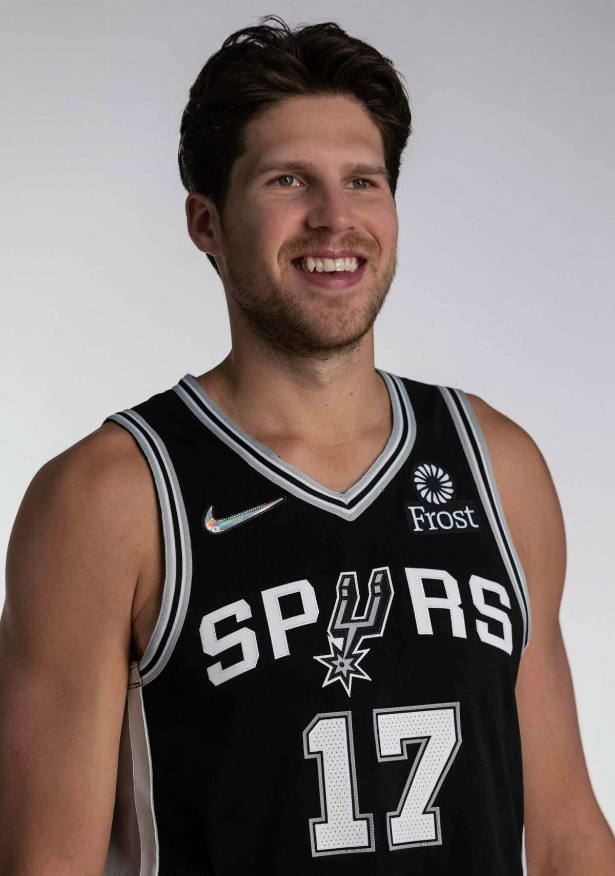 Spurs forward Doug McDermott poses for photos Monday, Sept. 27, 2021 at the Spurs practice facility during the team's media day.