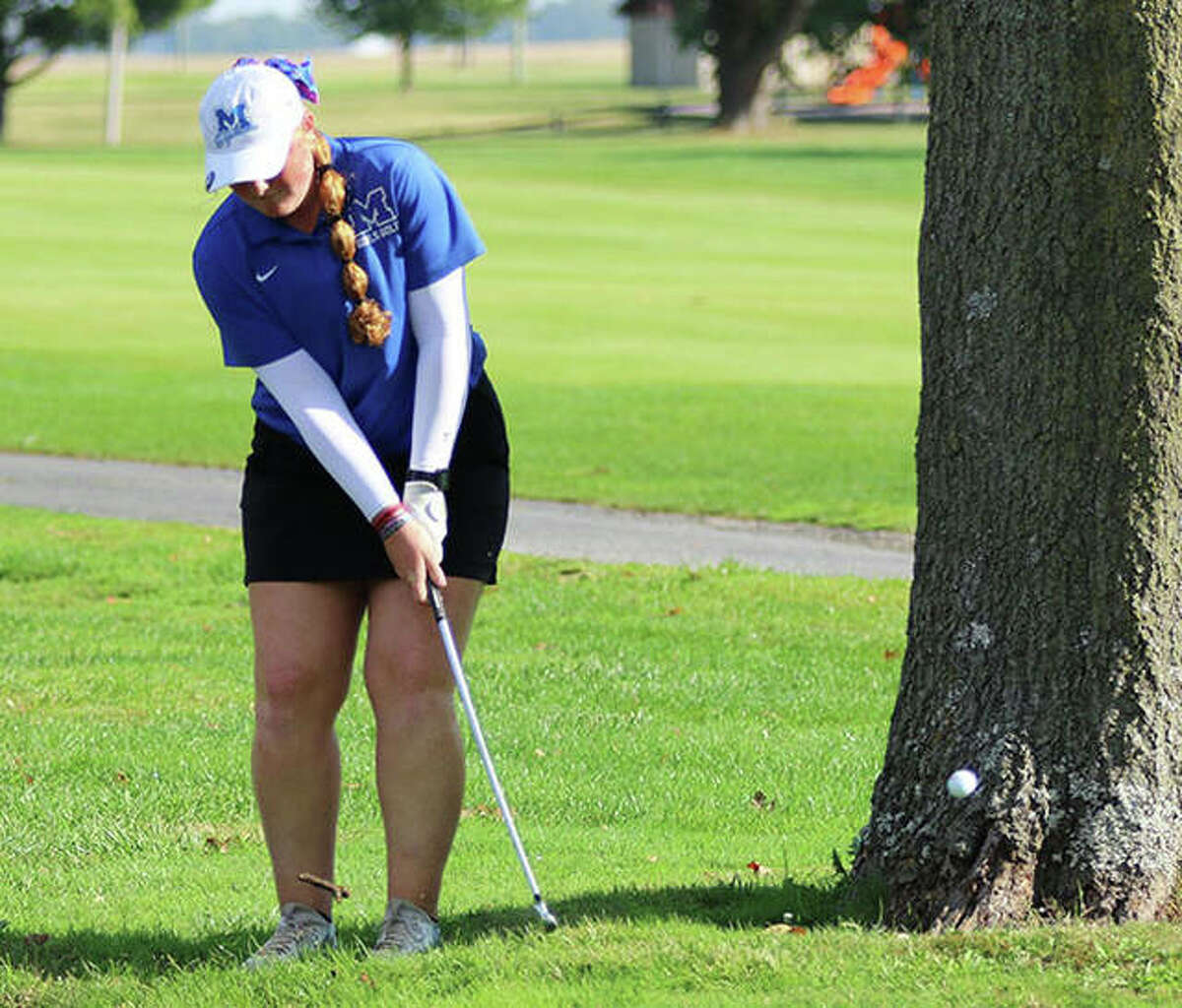 Marquette’s Gracie Piar hits back on the fairway on the first hole Thursday in the regional at Belk Park in Wood River. Piar bogeyed the hole, but came back to shoot 7-under par 65 to win the tournament.