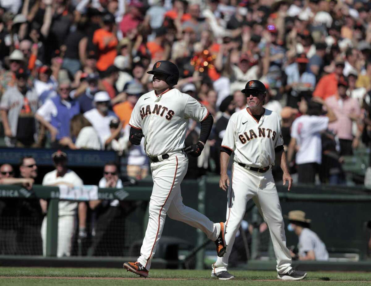 Victory and relief as Giants hoist NL West flag to complete season-long  miracle