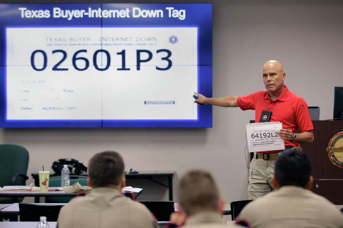 Travis County Precinct 3 Constable Sgt. Jose Escribano teaches a class for area law enforcement officers on fake paper license tags at the Woodlands Emergency Training Center on Sept. 24, 2021 in Conroe.