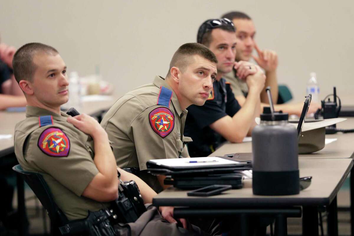 DPS and Constables listen as Travis County Precinct 3 Constable Sgt. Jose Escribano teaches a class for area law enforcement officers on fake paper license tags at the Woodlands Emergency Training Center Friday, Sep. 24, 2021 in Conroe.