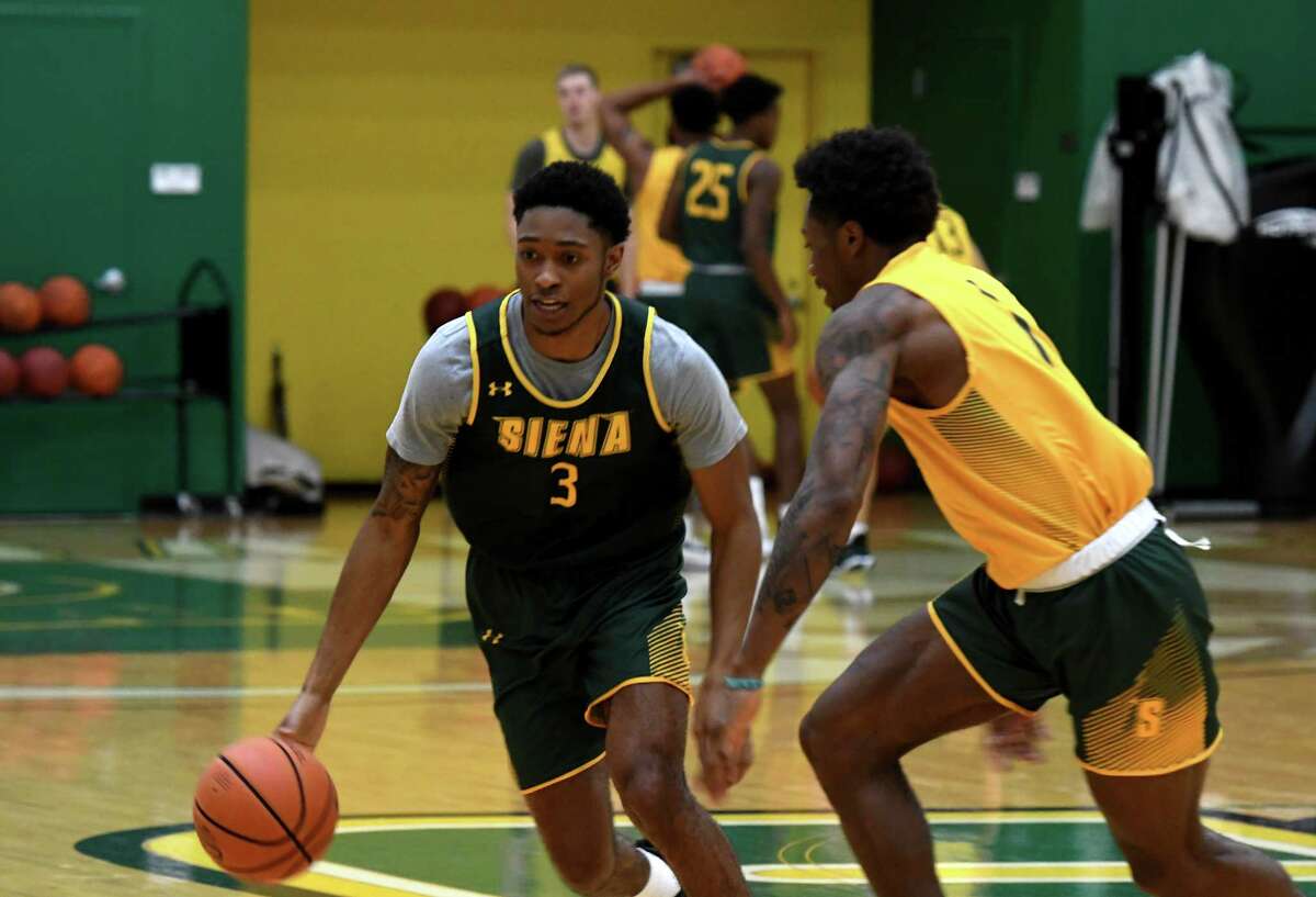 Siena College guard Colby Rogers, left, works on drills with teammate Jared Billups, right, during practice for the men?•s basketball team on Monday, Oct. 4, 2021, at the UHY Center on the Siena campus in Colonie, N.Y.