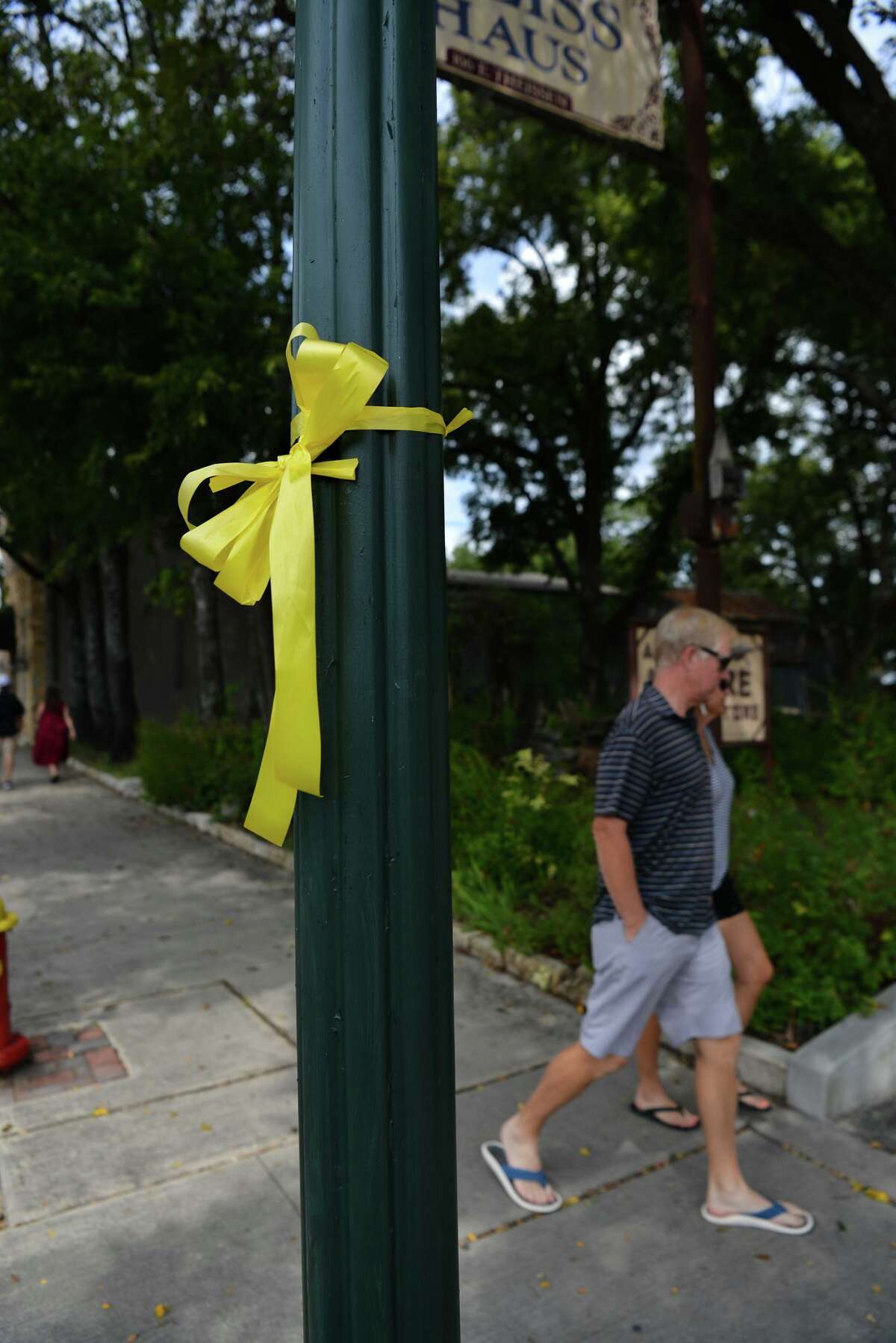 Yellow ribbons are displayed prominently on Main Street in Boerne to remember the 13 U.S. service members who were killed at the Kabul airport in late August and to keep up hope for the Americans who are still there.