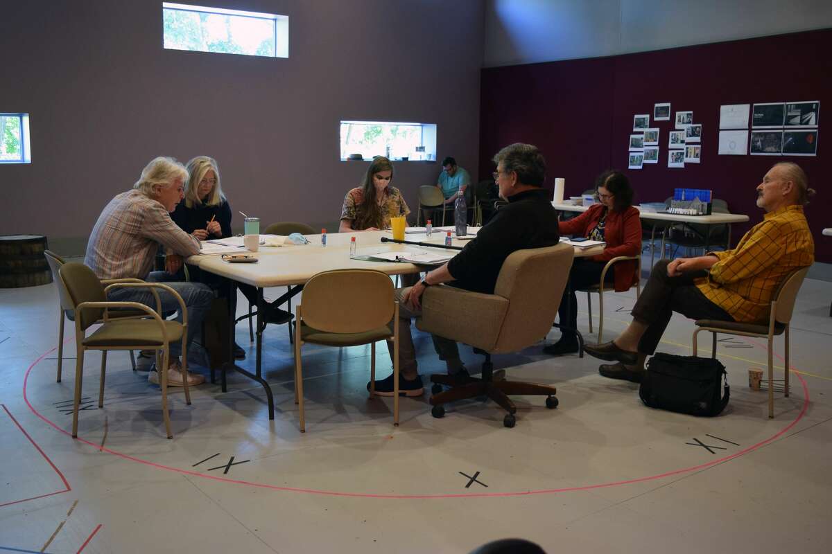 Members of cast and crew discuss "The Chairs" during the first day of rehearsals. (Shakespeare & Company)