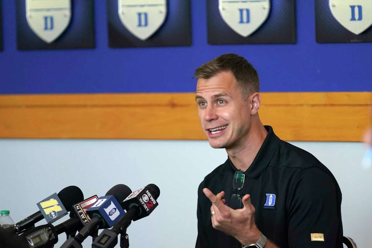 Duke associate head coach Jon Scheyer, shown at his school's Media Day last month, appeared at the Coaches vs. Cancer Basket Ball at Albany Capital Center on Oct. 4, 2021. He'll succeed Hall of Famer Mike Krzyzewski as Blue Devils head coach after this season. (AP Photo/Gerry Broome)