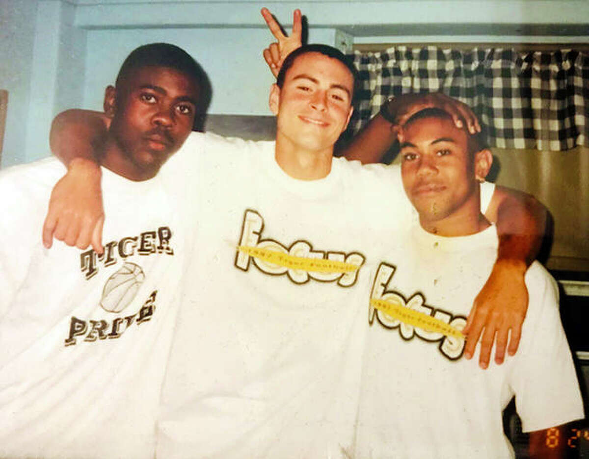 Edwardsville graduate Craig Mayfield, right, with first cousin Jon Harris, left, and former EHS football teammate and University of Missouri teammate Jimmie Dougherty at Mayfield’s and Dougherty’s freshman dorm in the fall of 1997.