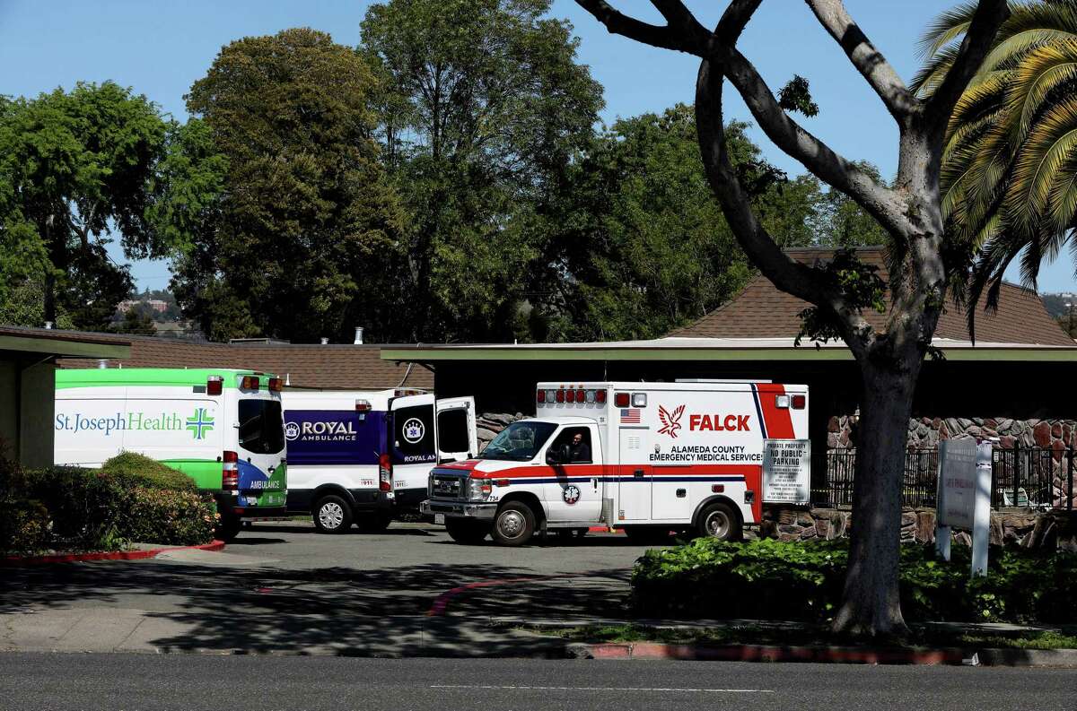 A Falck ambulance leaves the Gateway Care and Rehabilitation Center on Tuesday, April 21, 2020, in Hayward. Alameda County EMS says Falck failed to meet performance requirements in August and the agency is demanding that Falck implement a corrective action plan.