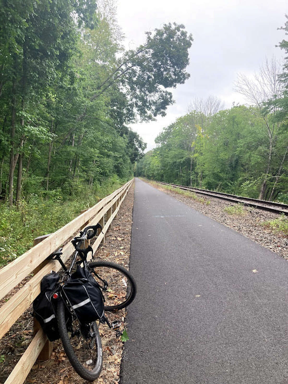 The Empire State Trail is popular with long-distance cyclists, but some are scrambling to rebook travel plans when Amtrak discontinued bike service on many trains.