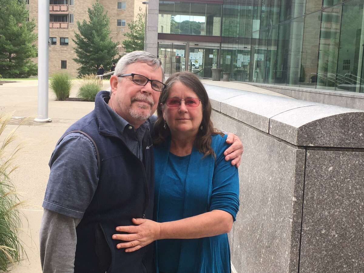 Lynn Mason and her husband Steven Fry, embrace on the plaza of Superior Court in Stamford after sentencing was passed down in a criminal case in which it was found by a jury that Mason was victimized. Chris von Keyserling was sentenced to house arrest by the judge.
