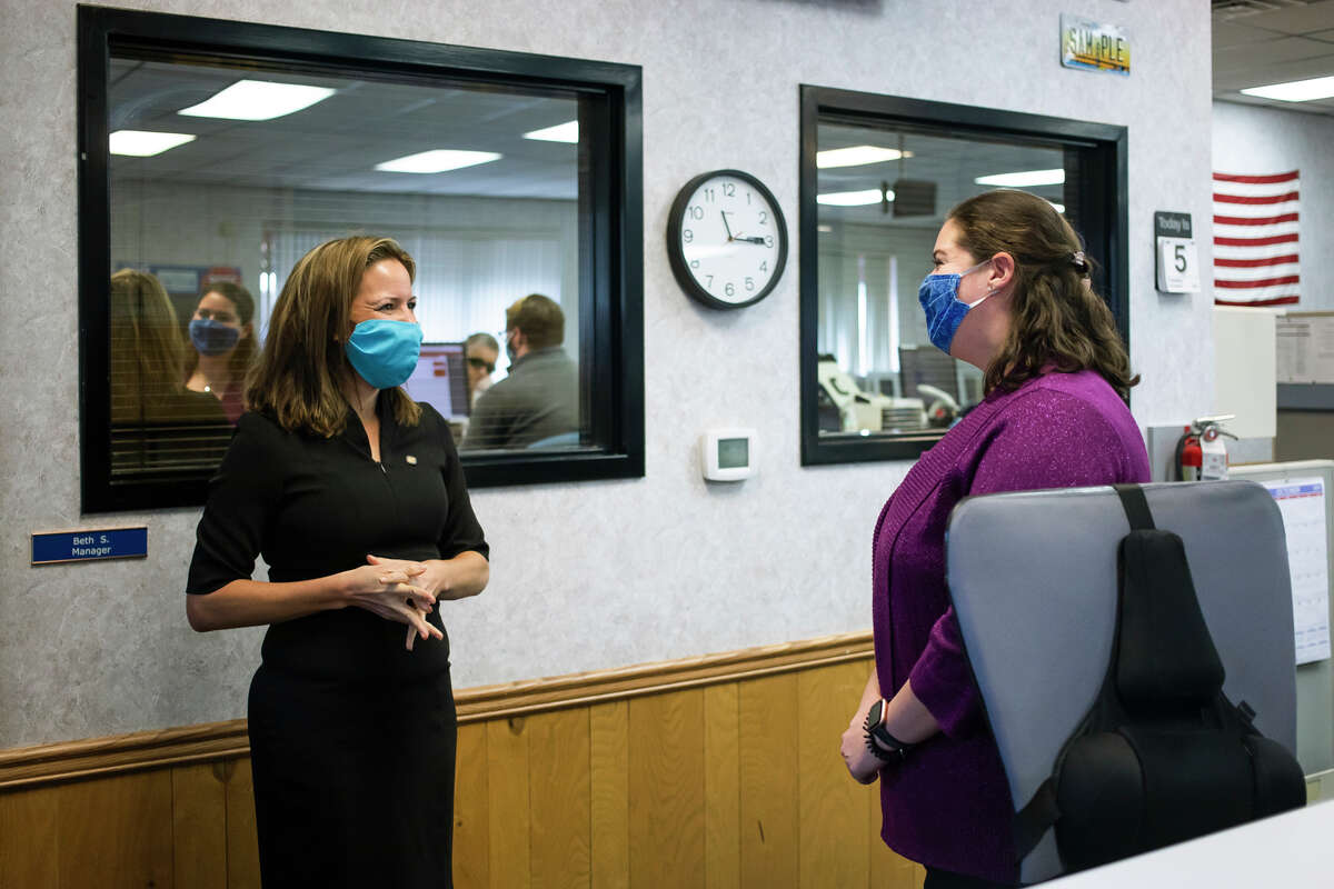 FILE—Michigan Secretary of State Jocelyn Benson visiting the Midland branch office.