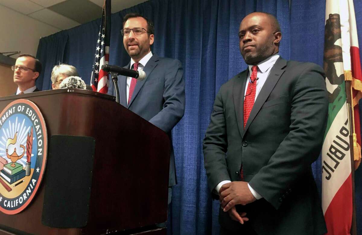 California schools Superintendent Tony Thurmond (right), seen at a 2019 news conference in Sacramento with State Sen. Ben Allen, D-Santa Monica, is stepping in to address the San Francisco school district’s financial tailspin.