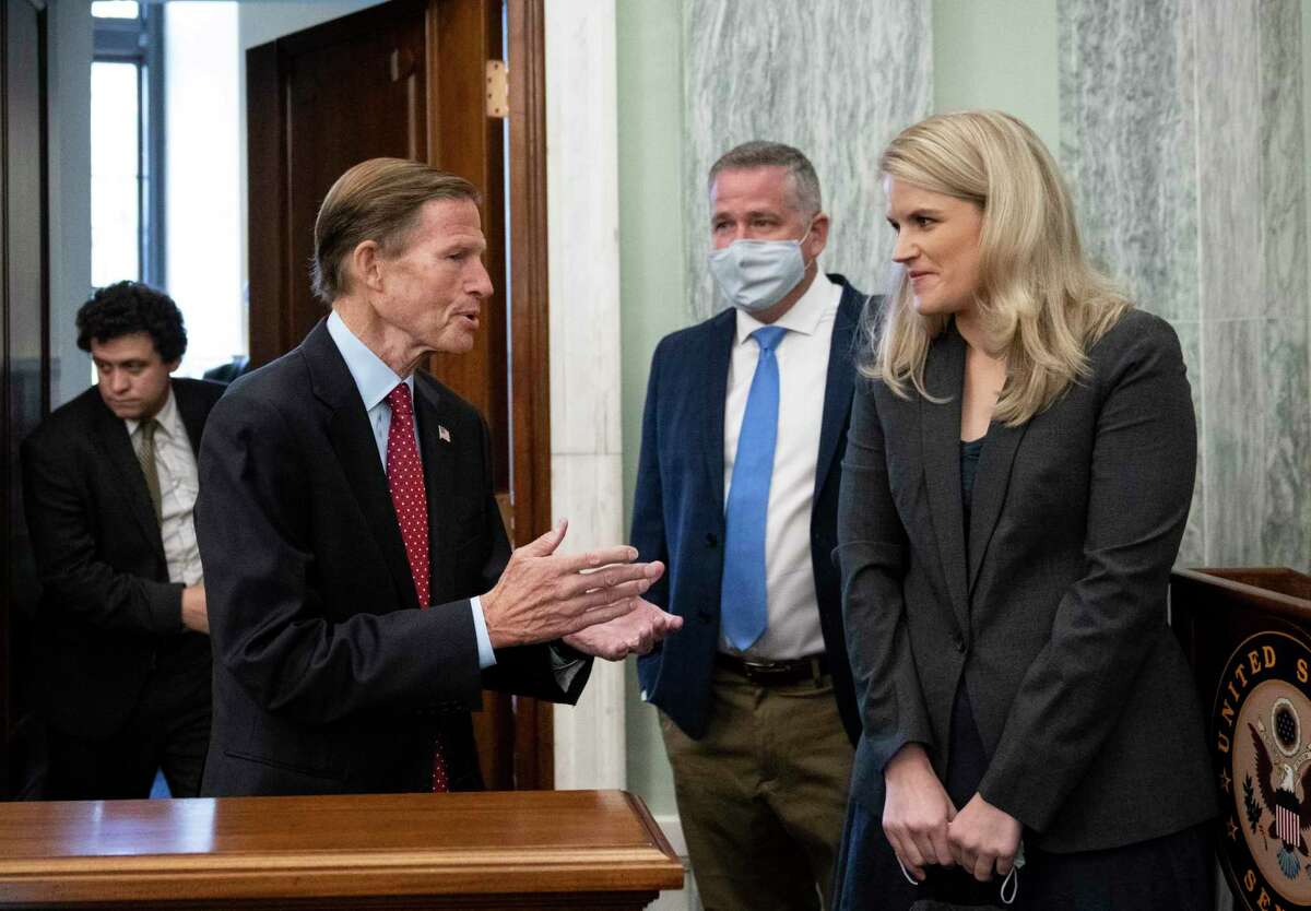 Sen. Richard Blumenthal, D-Conn., speaks with former Facebook employee and whistleblower Frances Haugen as she arrives to testify before a Senate Committee on Commerce, Science, and Transportation hearing on Capitol Hill on Tuesday.