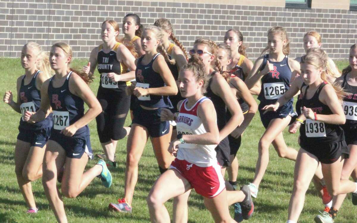 Big Rapids, Chippewa Hills and Reed City girls and other CSAA Gold runners start the cross country race on Tuesday at  BRHS. (Pioneer photo/John Raffel)