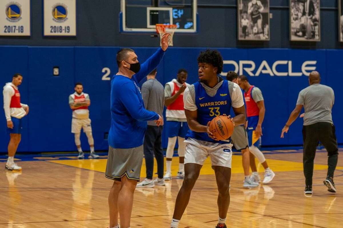 Warriors player-development coach Dejan Milojevic, shown above working with James Wiseman at a recent practice, has a proven track record of maximizing promising young big men's potential.