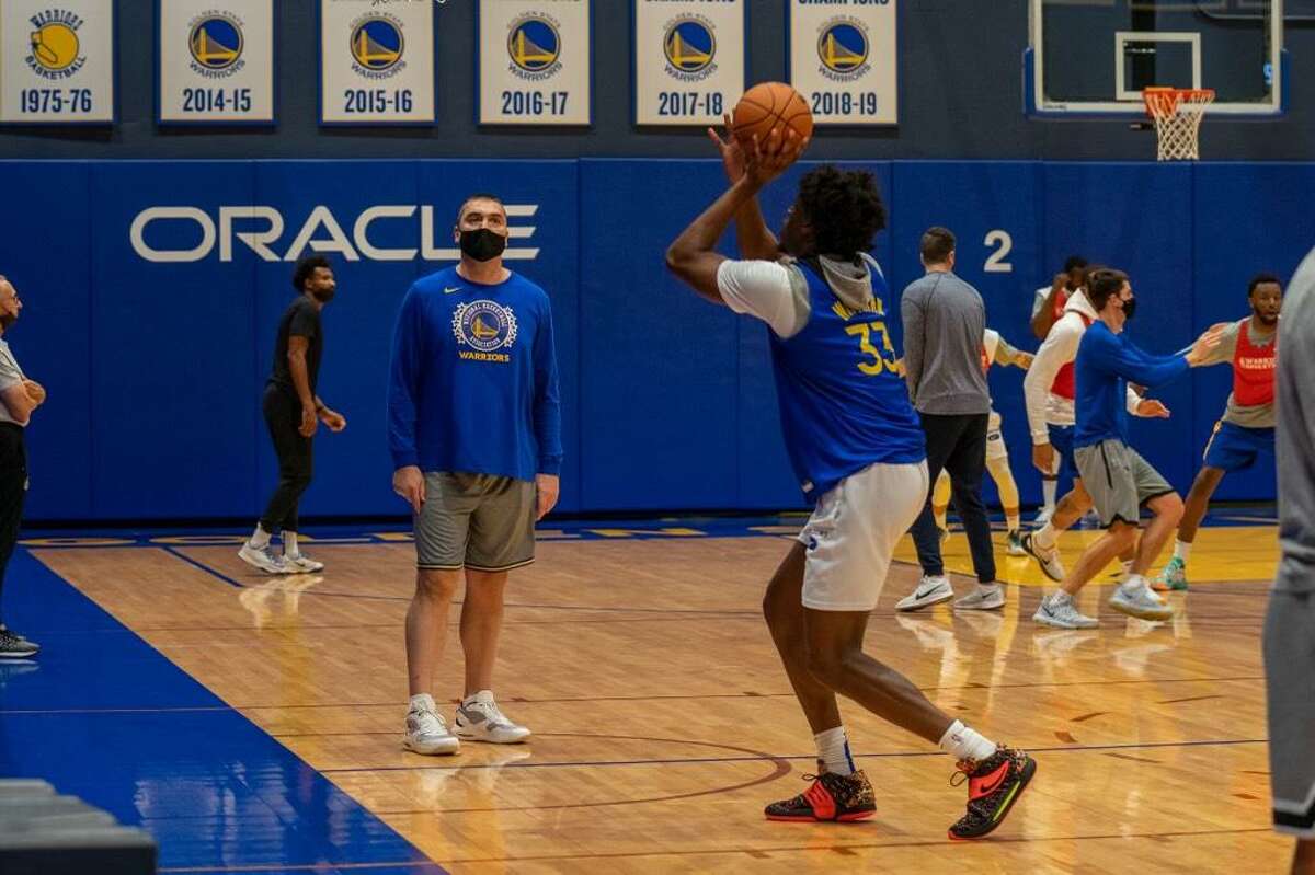 Warriors player-development coach Dejan Milojevic, shown above working with James Wiseman at a recent practice, has a proven track record of maximizing promising young big men's potential.