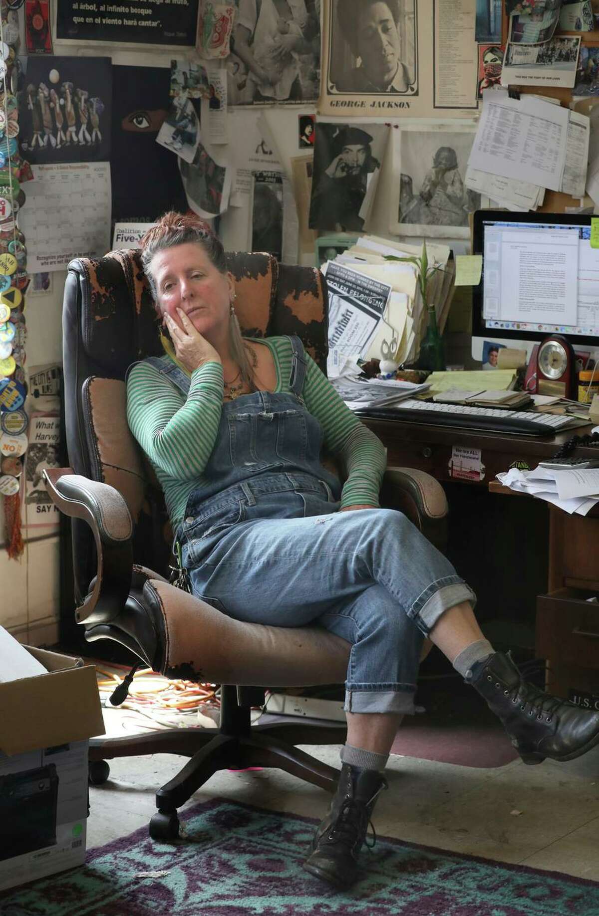 Director Jennifer Friedenbach of Coalition on Homeless talks with staff in the office on Monday, Aug. 5, 2019, in San Francisco, Calif. Coalition on Homeless have lost their lease and have to move by October.