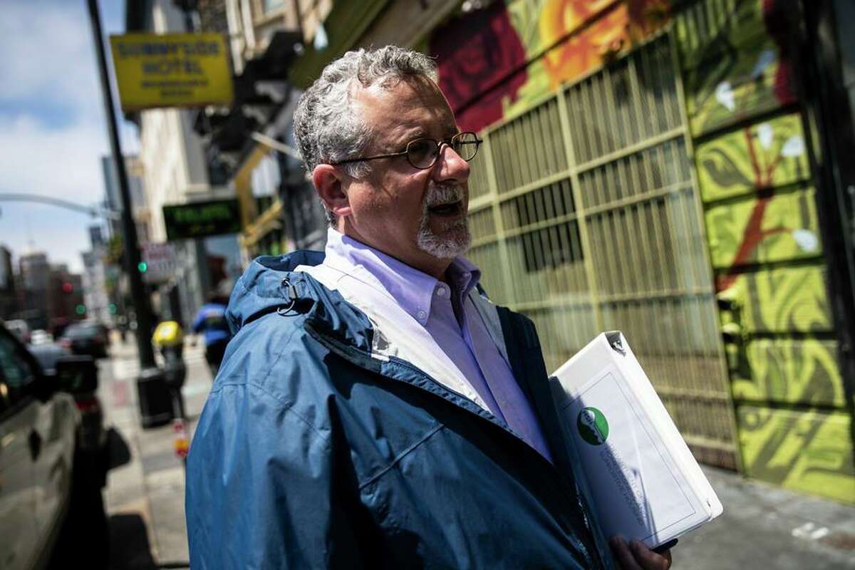 6th St between Minna & Natoma St, 2:11PM: Jeff Kositsky, director of San Francisco Department of Homelessness and Supportive Housing, prepares to go into a meeting at The Minna Lee in San Francisco, Calif. on Tuesday, June 18, 2019.