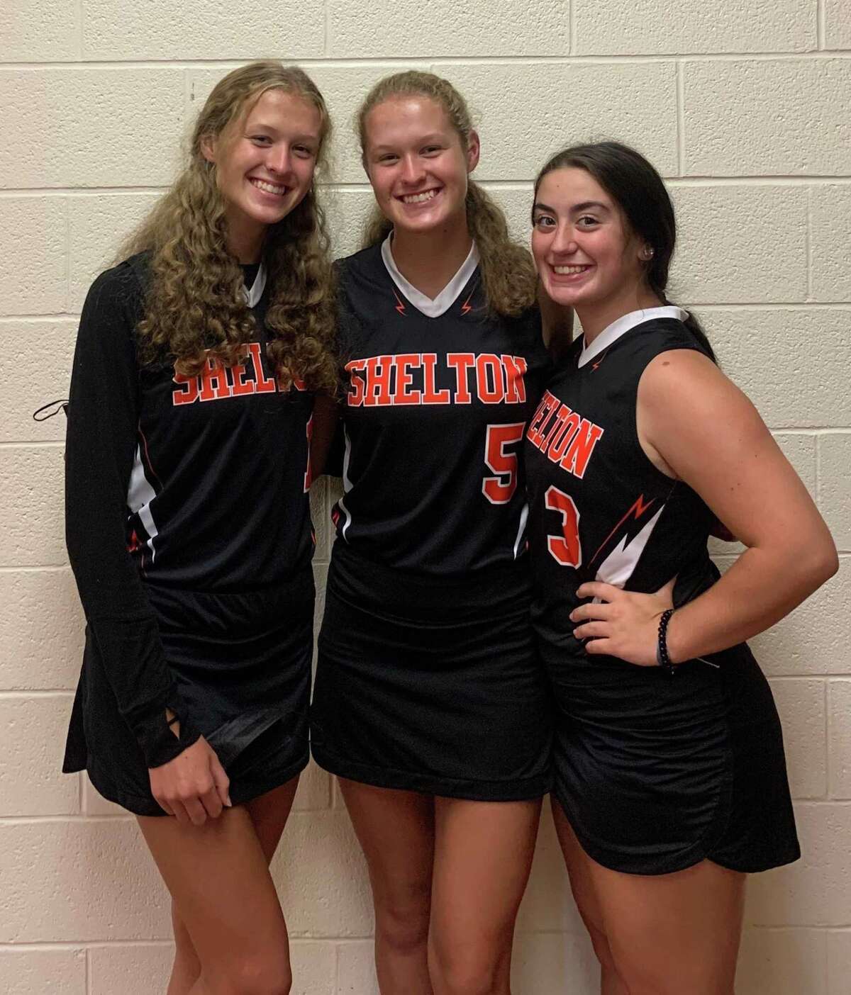 Amanda Kiman, Rachel Kiman and Jackie Jenco captain Shelton's field hockey team.