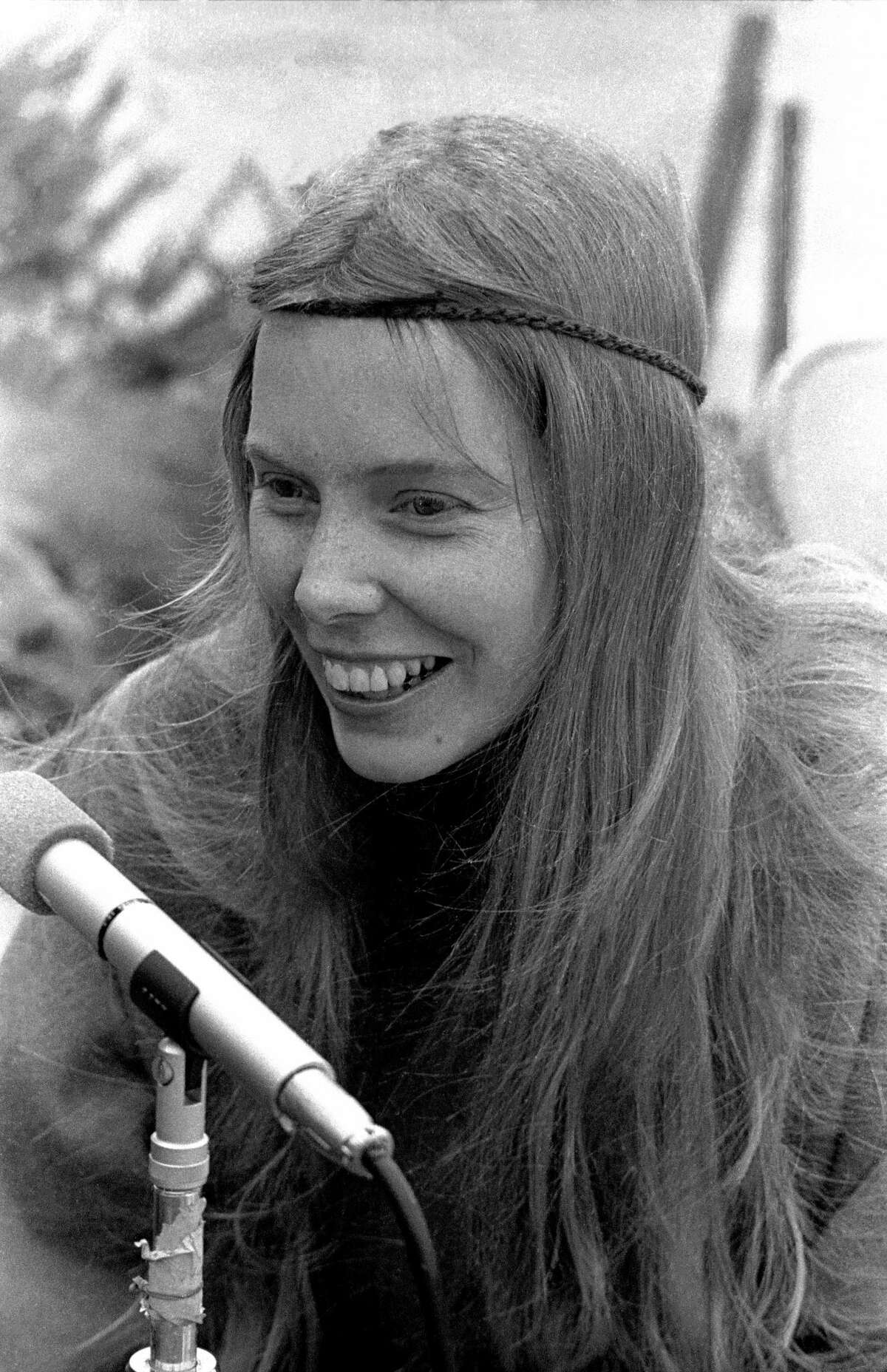 Canadian singer-songwriter Joni Mitchell poses for a portrait during the 1969 Big Sur Folk Festival on September 13-14, 1969 at the Esalen Institute in Big Sur, California.