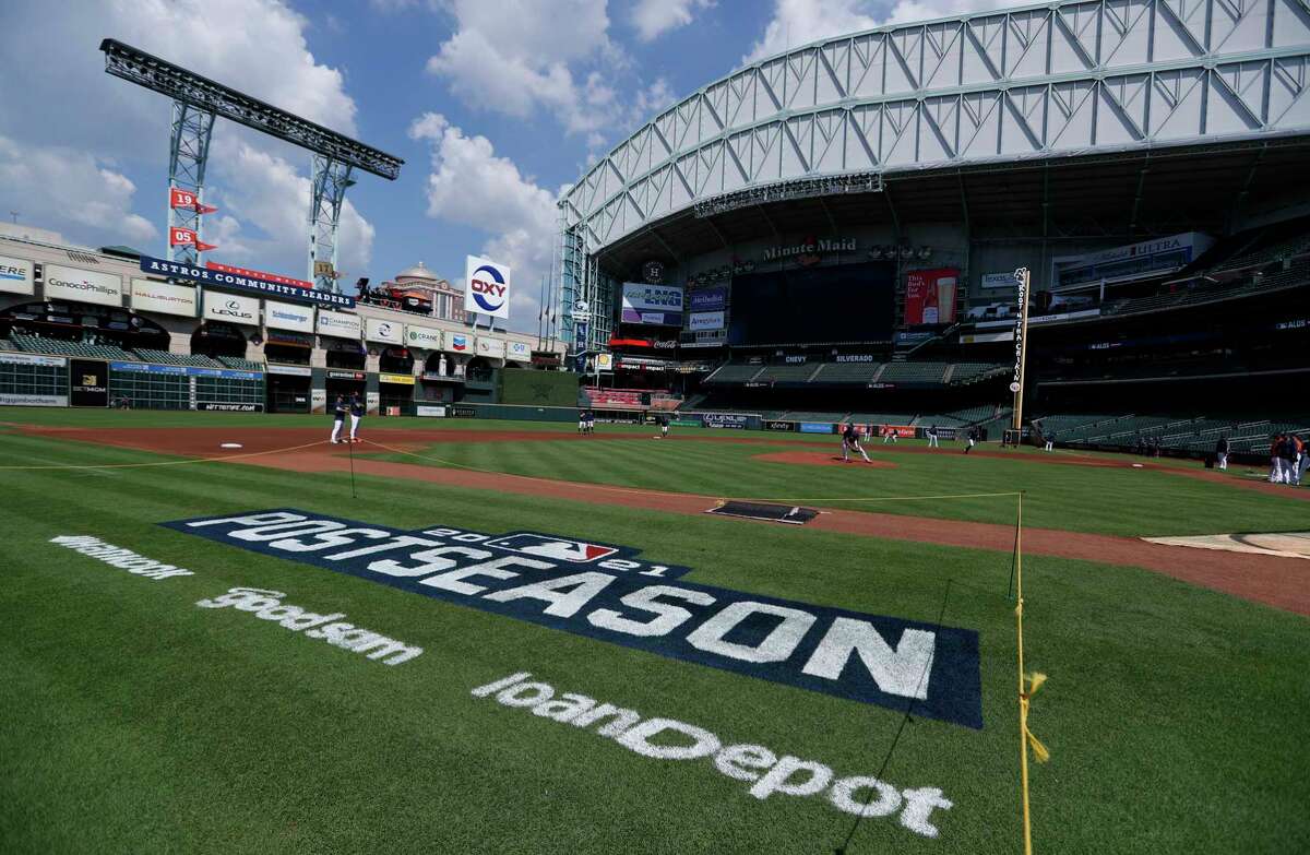 The Houston Astros on the field, painted with the Post Season logo during batting practice ahead of Game 1 of the American League Division Series playoffs at Minute Maid Park, Wednesday, Oct. 6, 2021, in Houston.