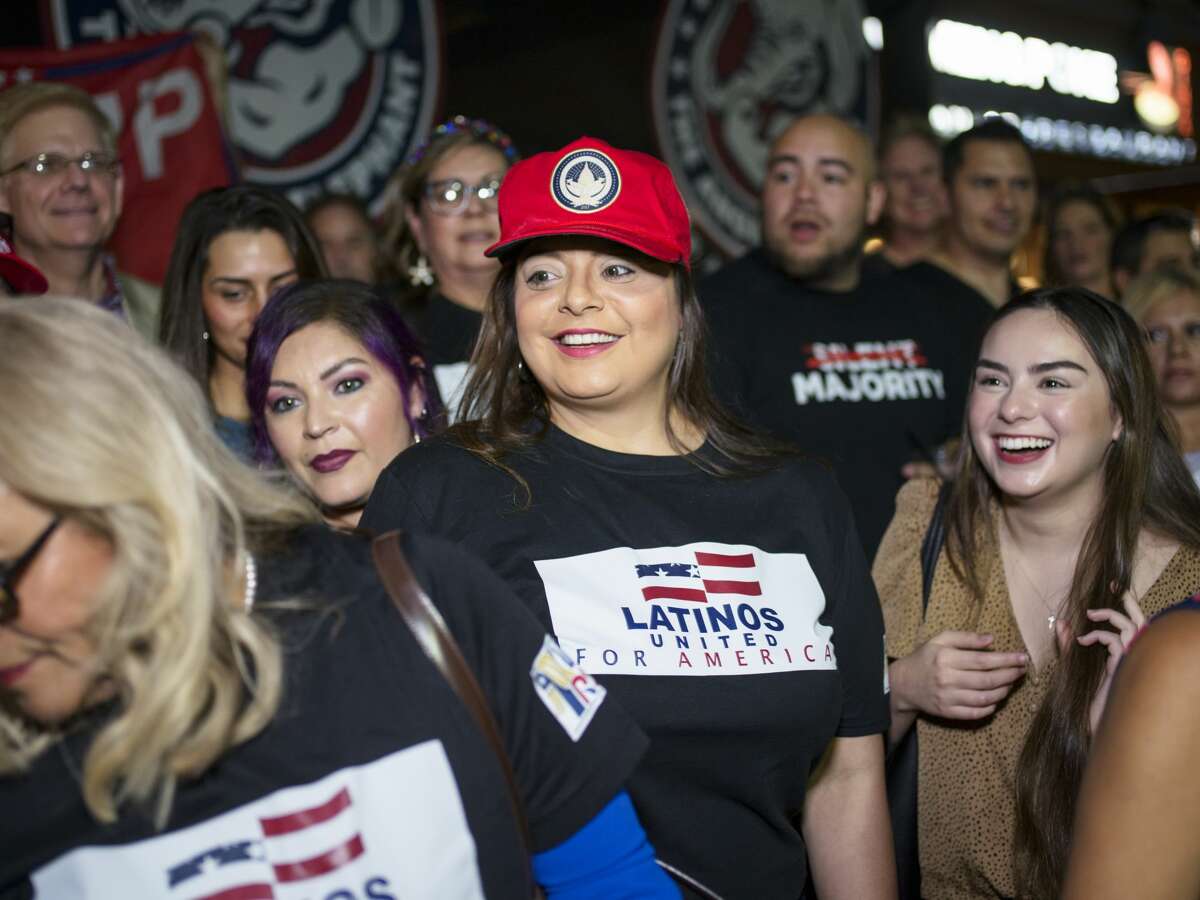 SAN ANTONIO, TX - MAY 14: Jen Salinas, Vice President of Latinos 4 Trump, takes photos with the groups supporters after a meetup in San Antonio, Tx., U.S. on Friday, May 14, 2021. Latinos 4 Trump invited local candidates to speak with their supporters during the event held at The Angry Elephant bar in San Antonio. (Photo by Matthew Busch for The Washington Post via Getty Images)