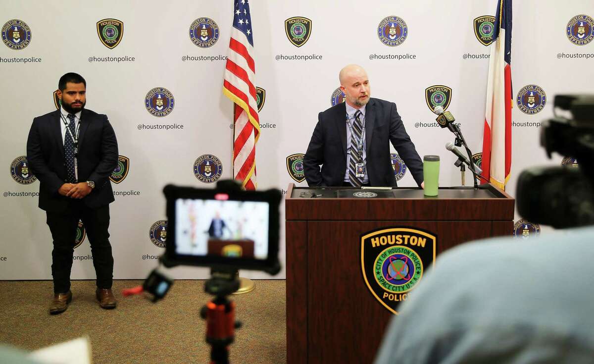 Houston Police Dept. detective Sgt. Michael Burrow talks to the media about Instagram influencer Alexis Sharkey homicide at the police headquarters in Houston on Wednesday, Oct. 6, 2021. Sharkey's husband was found dead with a self-inflicted gunshot wound by the U.S. Marshalls as they tried to issue a warrant for his arrest for her murder in 2020.