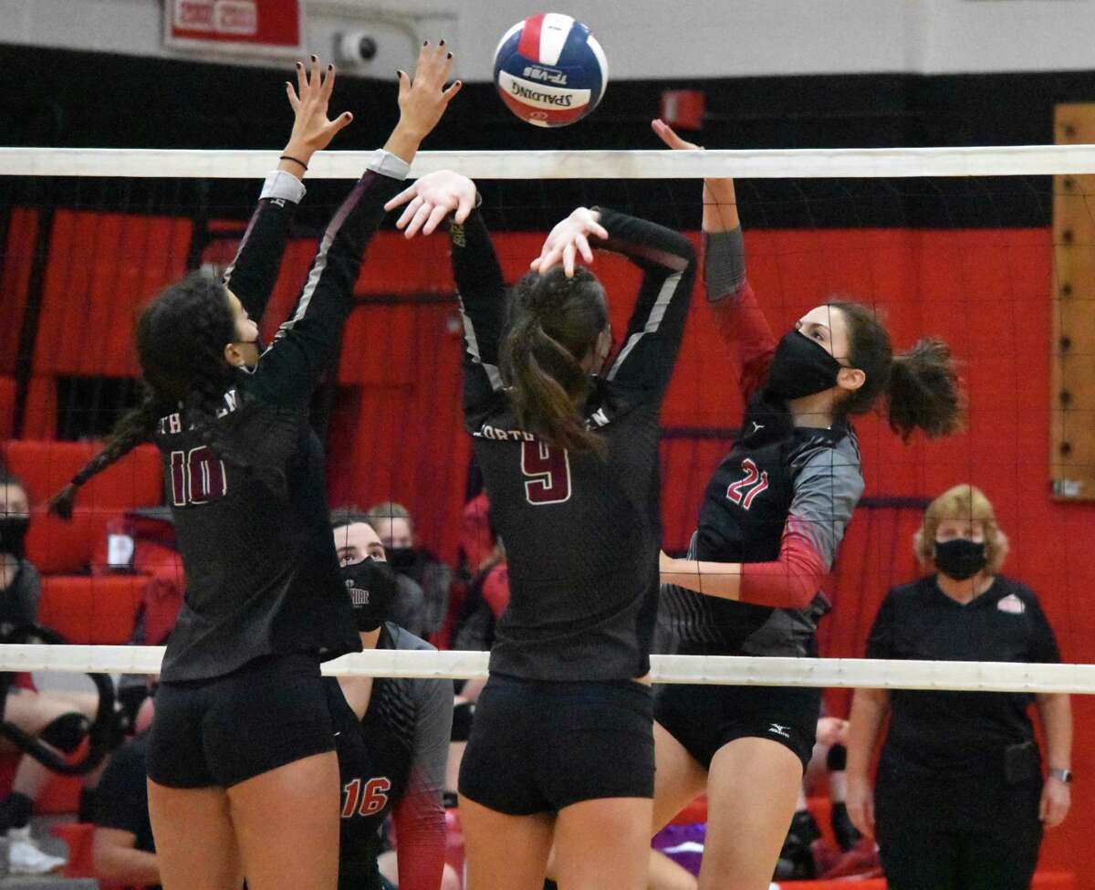Cheshire’s Avery Mola spikes the ball in SCC Division B girls volleyball championship game at Cheshire High School on Friday, Oct. 13, 2020.