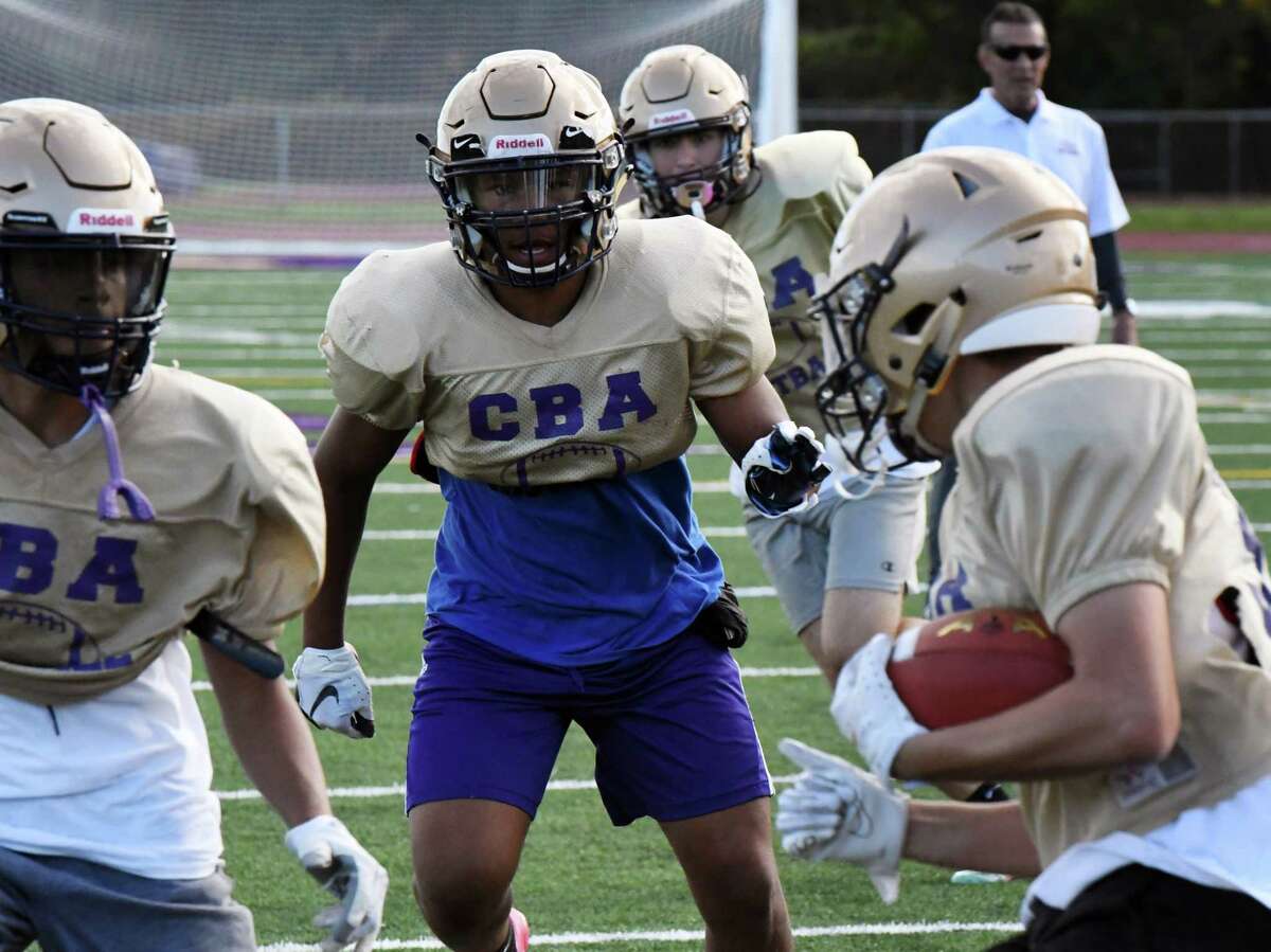 Christian Brothers Academy's Jaylen Riggins, center, works at linebacker during a practice session on Oct. 6, 2021. Riggins became a leader of the defense when he came over from Troy.