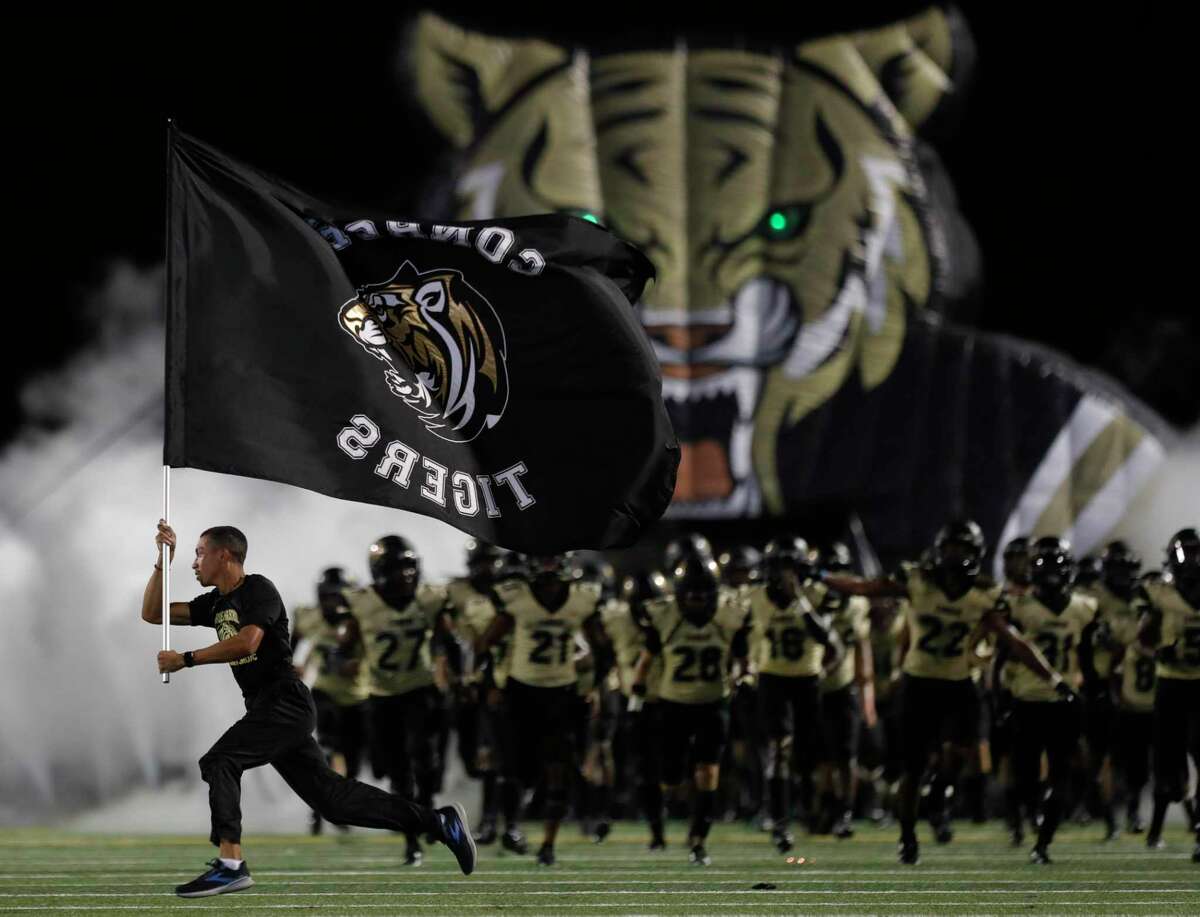 The Conroe Tigers take the field for the second half during a non-district high school football game at Buddy Moorhead Stadium, Friday, Aug. 27, 2021, in Conroe.