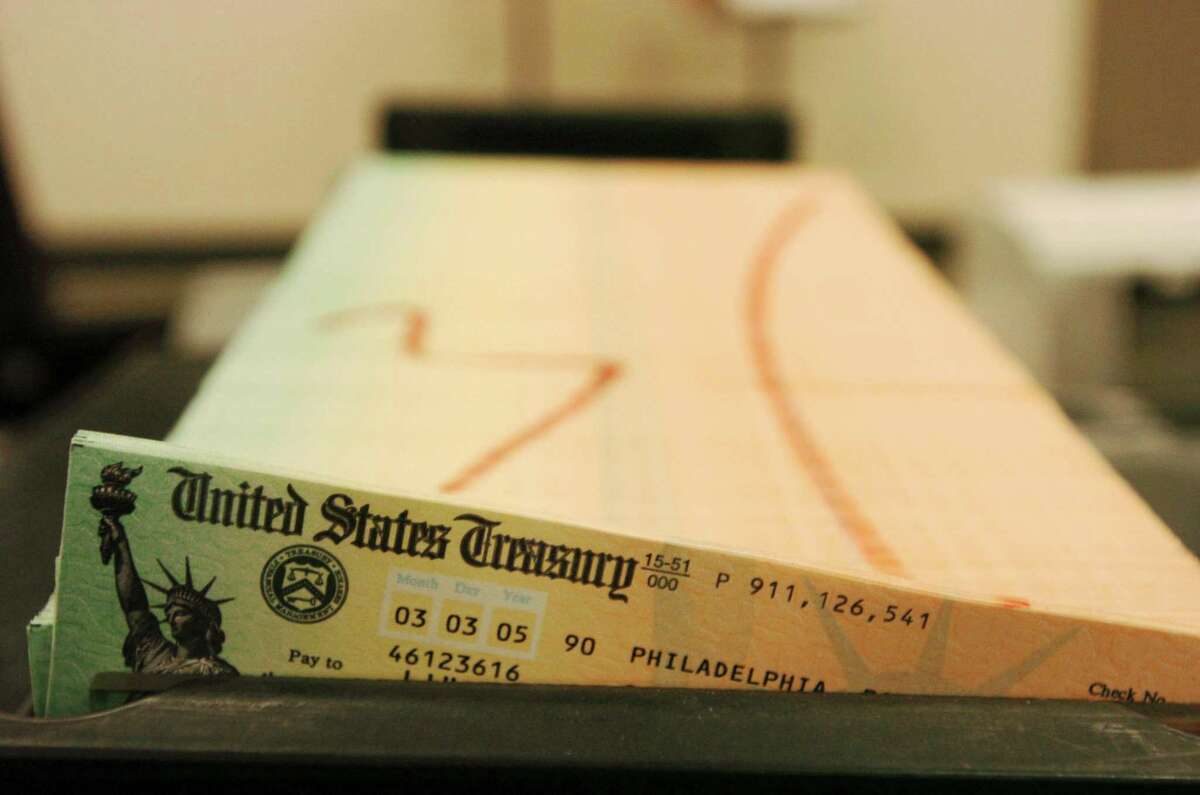 In this file photo, trays of printed Social Security checks wait to be mailed from the U.S. Treasury’s Financial Management services facility in Philadelphia.