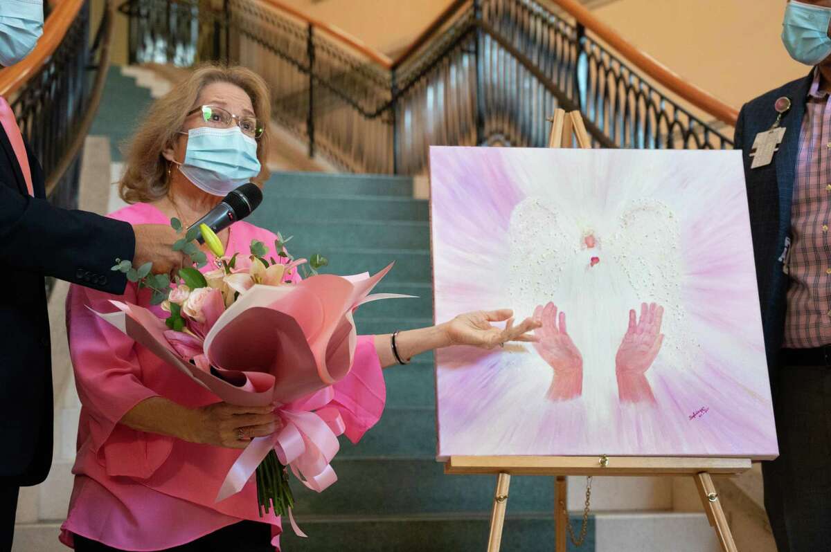 Angel of Hope Artist Sylvia Castañeda explains her inspiration for this year's painting Wednesday, Oct. 6, 2021, at Laredo Medical Center during the 12th Annual Angel of Hope unveiling.