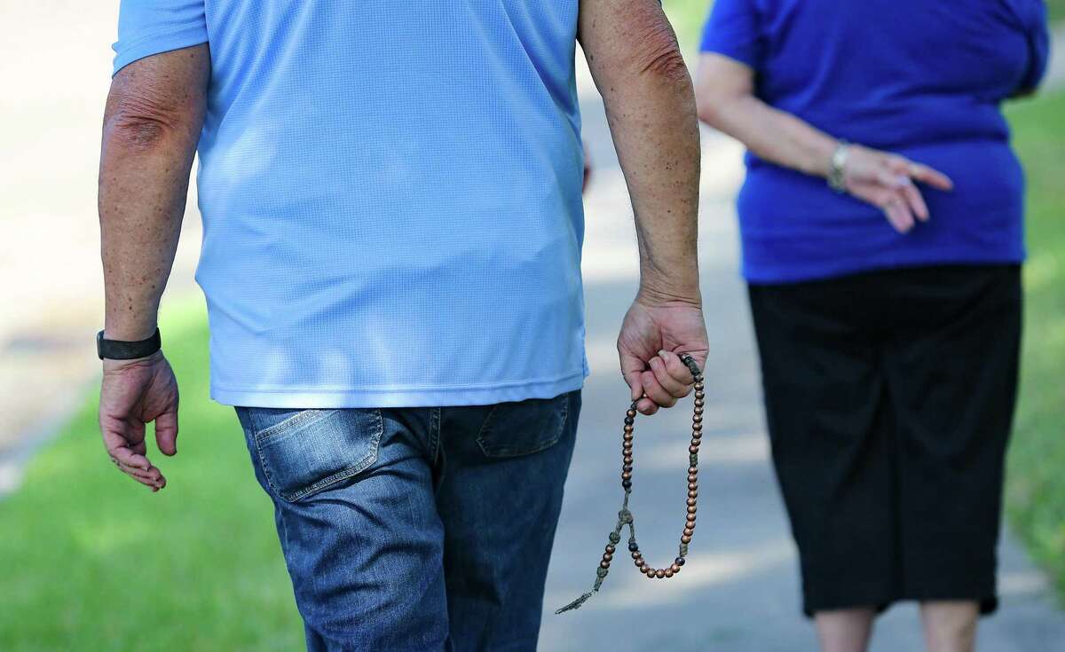 People pray the Rosary outside Planned Parenthood property in Houston on Friday, Sept. 3, 2021.