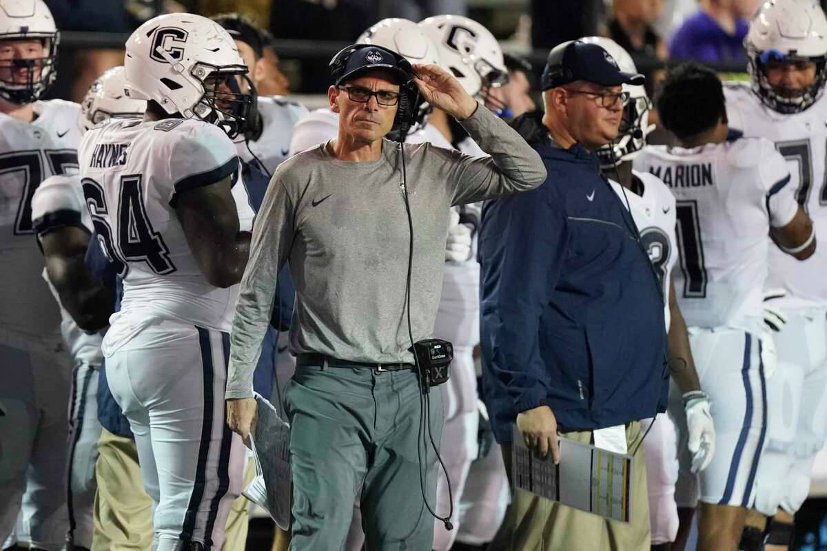 UConn coach Lou Spanos watches from the sideline during Saturday's loss at Vanderbilt in Nashville.