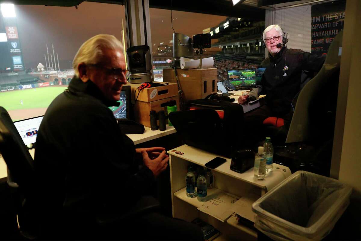 San Francisco Giants broadcasters Mike Krukow, right, and Duane Kuiper before an MLB game at Oracle Park in San Francisco in September 2020.