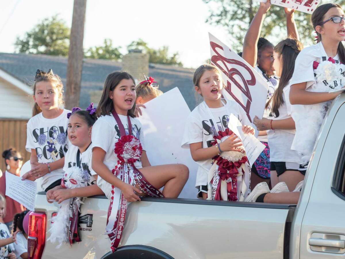 LHS supporters line the streets around Legacy High 10/07/2021 as the homecoming parade makes its way toward the school. Tim Fischer/Reporter-Telegram