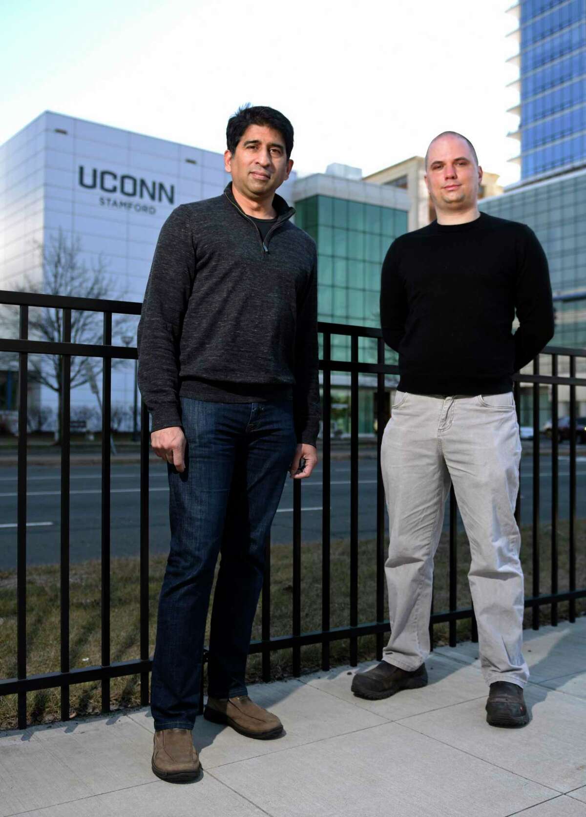 Whether’s CEO, Vijay Jayachandran, left, and chief technology officer, Peter Watson, stand outside UConn's academic building at 1 University Place in downtown Stamford, Conn., on March 3, 2021. Whether is one of the companies participating in the TIP Digital incubator program for data-science startups at the University of Connecticut-Stamford.